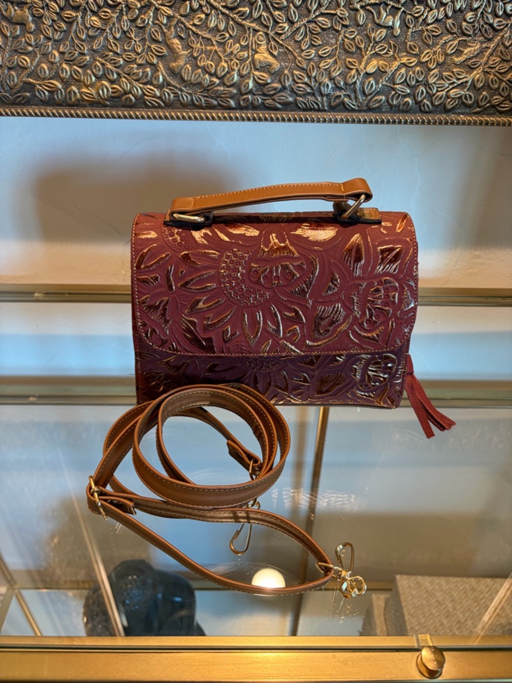 Embossed Floral Mini Crossbody Bag in Burgundy with Tan Strap